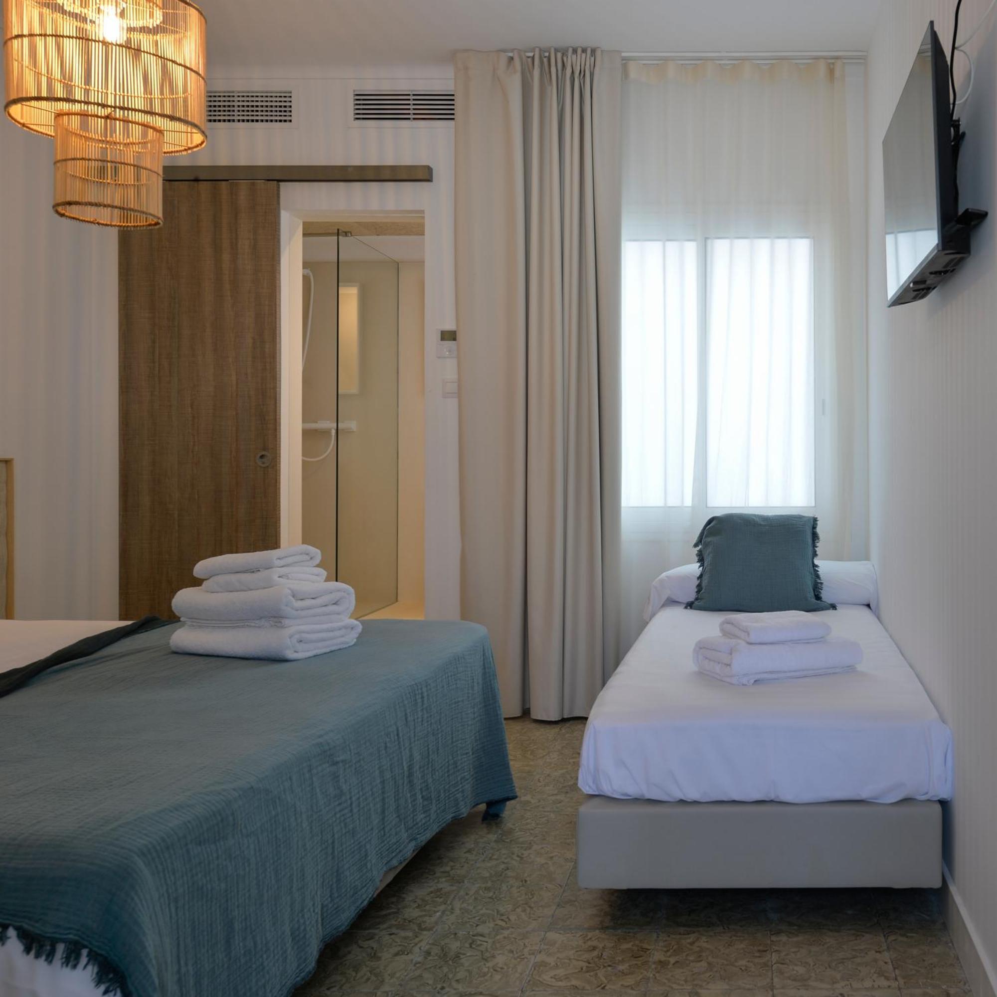 Chambre Triple – Vue sur Intérieur